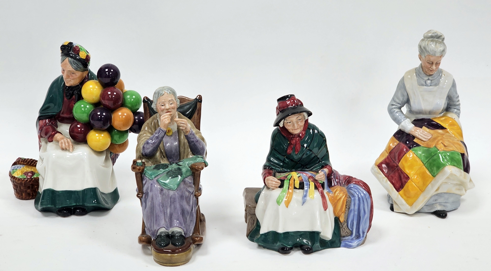 Four Royal Doulton bone chilna figures comprising 'Silks and Ribbons' HN2017, 'Even Tide' HN2814, 'A