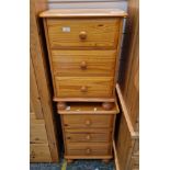 Pair of modern pine bedside chests of drawers, each with three short drawers, on bun feet, 62cm high