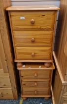 Pair of modern pine bedside chests of drawers, each with three short drawers, on bun feet, 62cm high