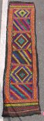 Eastern kelim runner with six multicoloured sections of lozenges and diagonal stripes, geometric