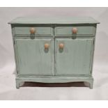 Vintage sage green distressed painted kitchen cupboard, with two frieze drawers above two panelled
