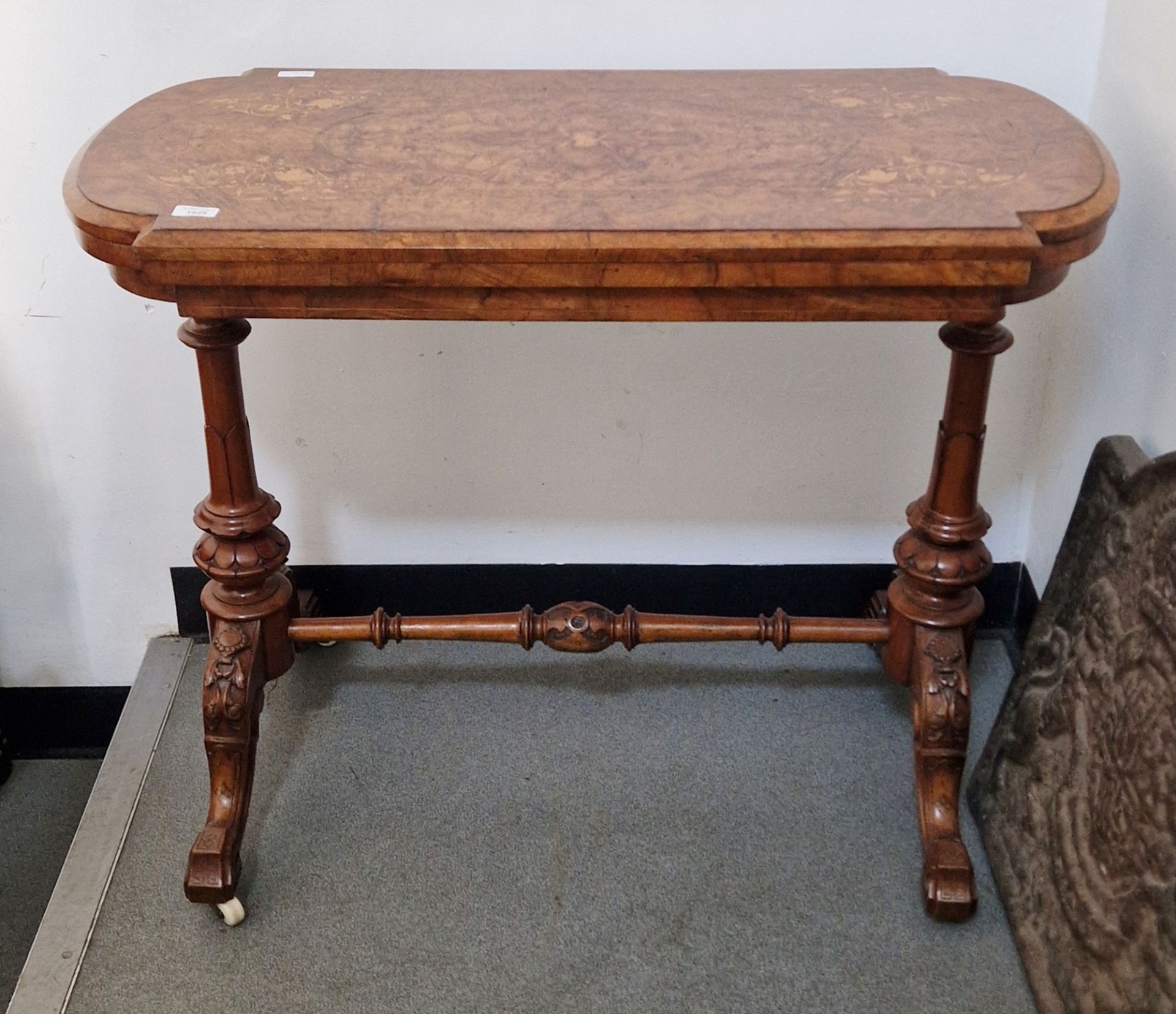 Late 19th century burr walnut hall table with inlaid marquetry scrolling foliate motifs, on carved