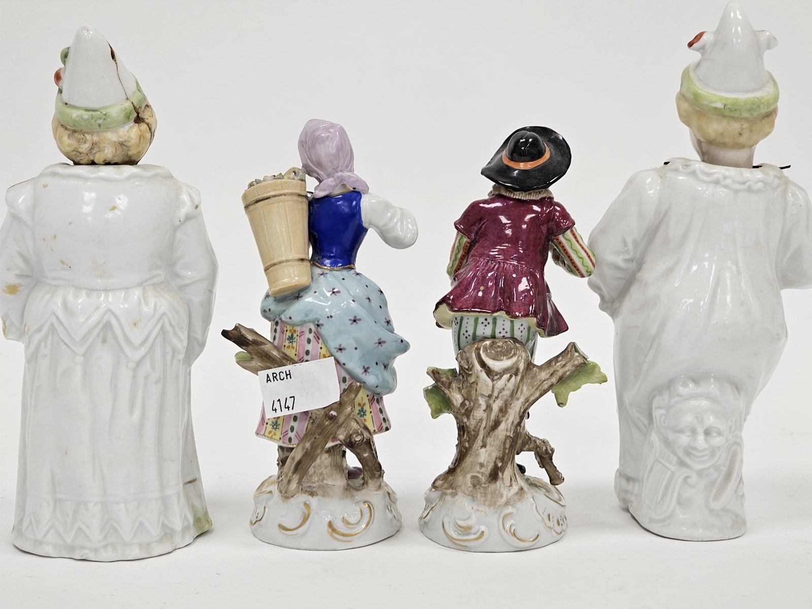 Pair of continental porcelain Meissen-style figures, circa 1900, each modelled carrying baskets of - Image 2 of 5