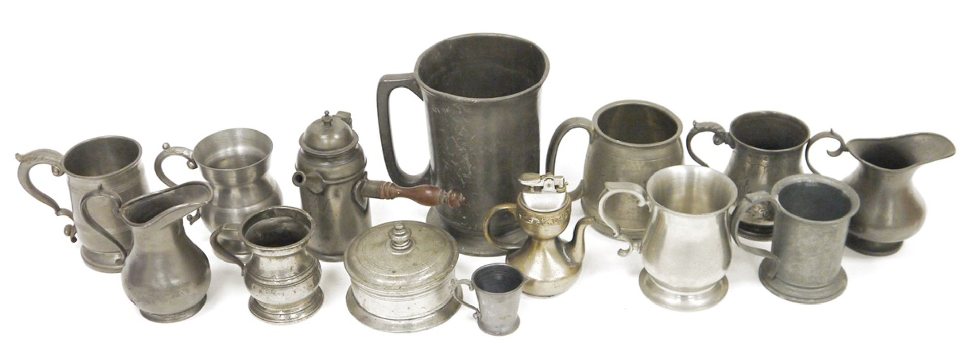 Collection of pewter baluster jugs and mugs and cylindrical tankards