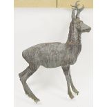 Grey-painted lead garden model of a deer, modelled standing foursquare, 84cm high  Condition