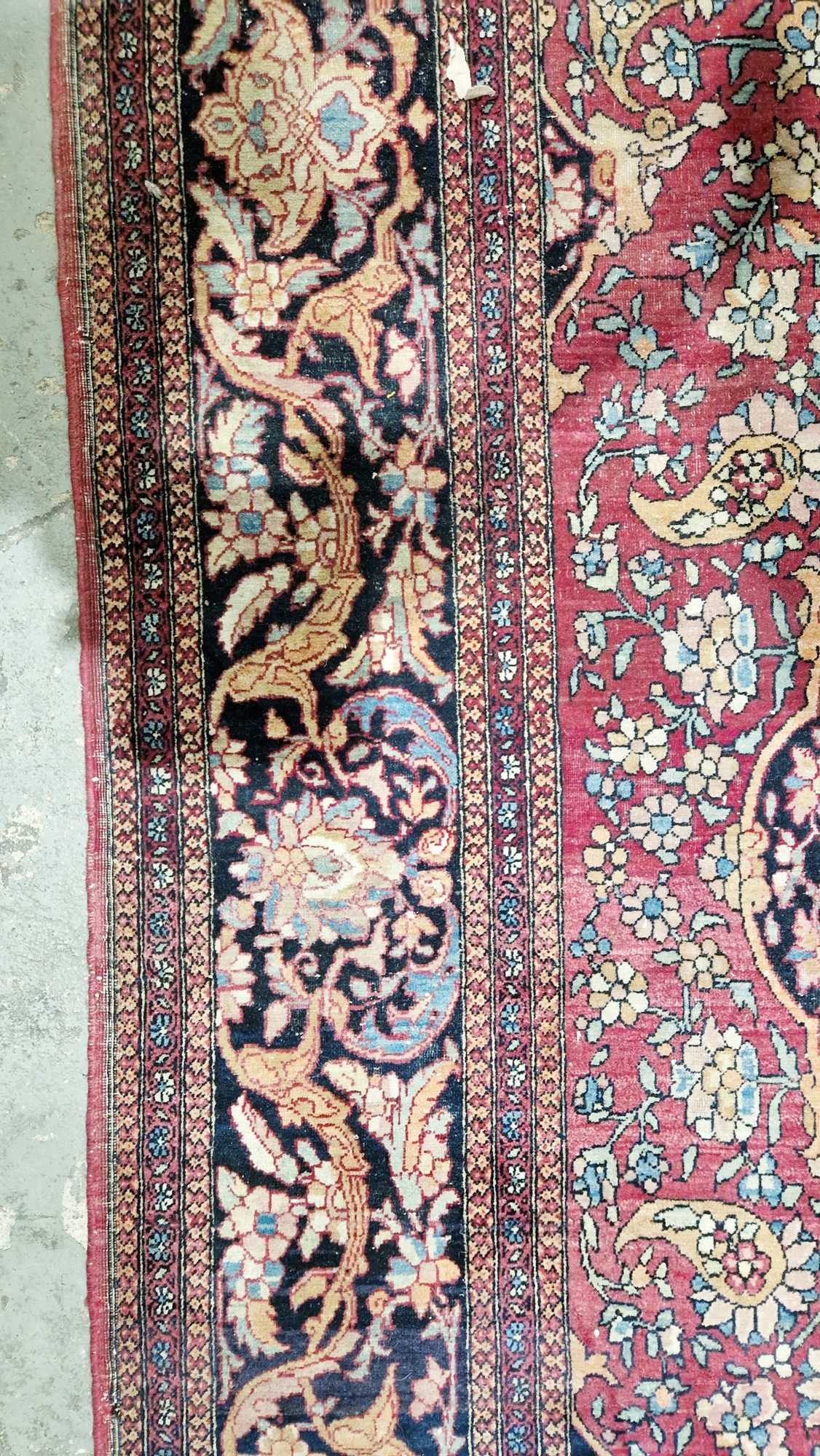 Eastern wool rug of Persian design, having black arabesque to the cherry red field with allover - Image 11 of 32