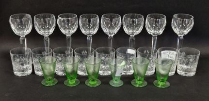 Eight Waterford wine glasses, panel cut bowls on faceted stems, etched marks, six early 20th century