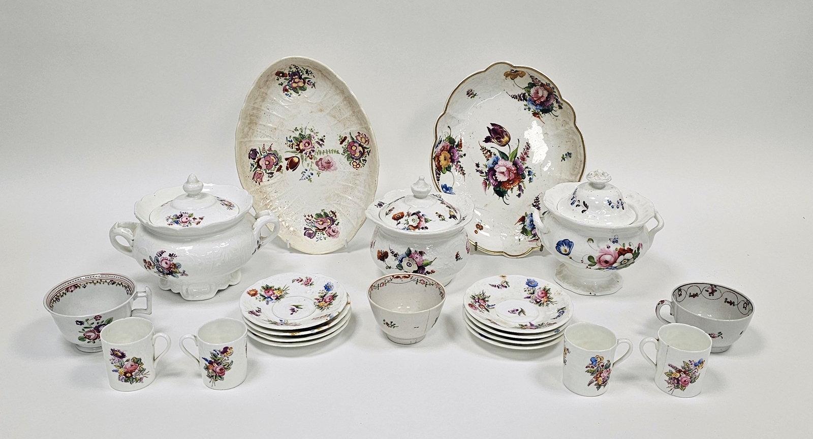 Three late 18th century English porcelain teacups decorated in the famille rose pallette, a