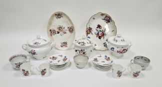 Three late 18th century English porcelain teacups decorated in the famille rose pallette, a