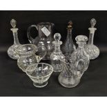 Group of 19th century cut glass decanters including two shaft and globe examples with etched