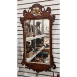 Early Georgian-style mahogany gilt-framed mirror with eagle finial (lacking head), 95cm x 52cm