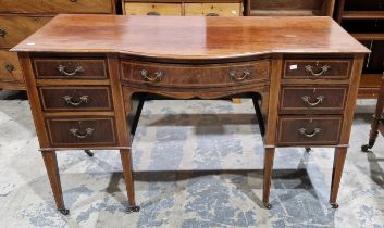 Edwardian mahogany inlaid breakfront dressing table, with curved frieze drawer flanked by two