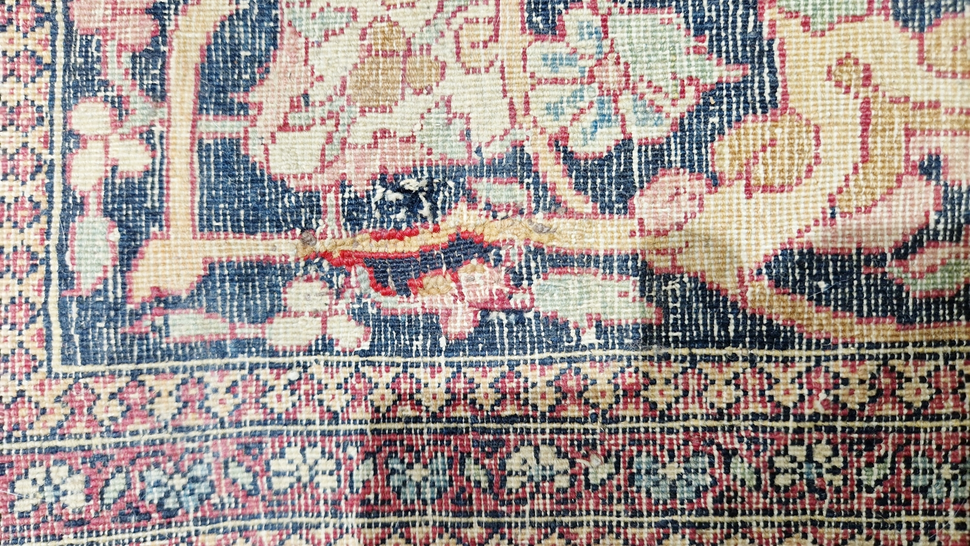 Eastern wool rug of Persian design, having black arabesque to the cherry red field with allover - Image 32 of 32
