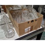 Large collection of cut glassware including a shaft and globe shaped decanter and stopper, cut