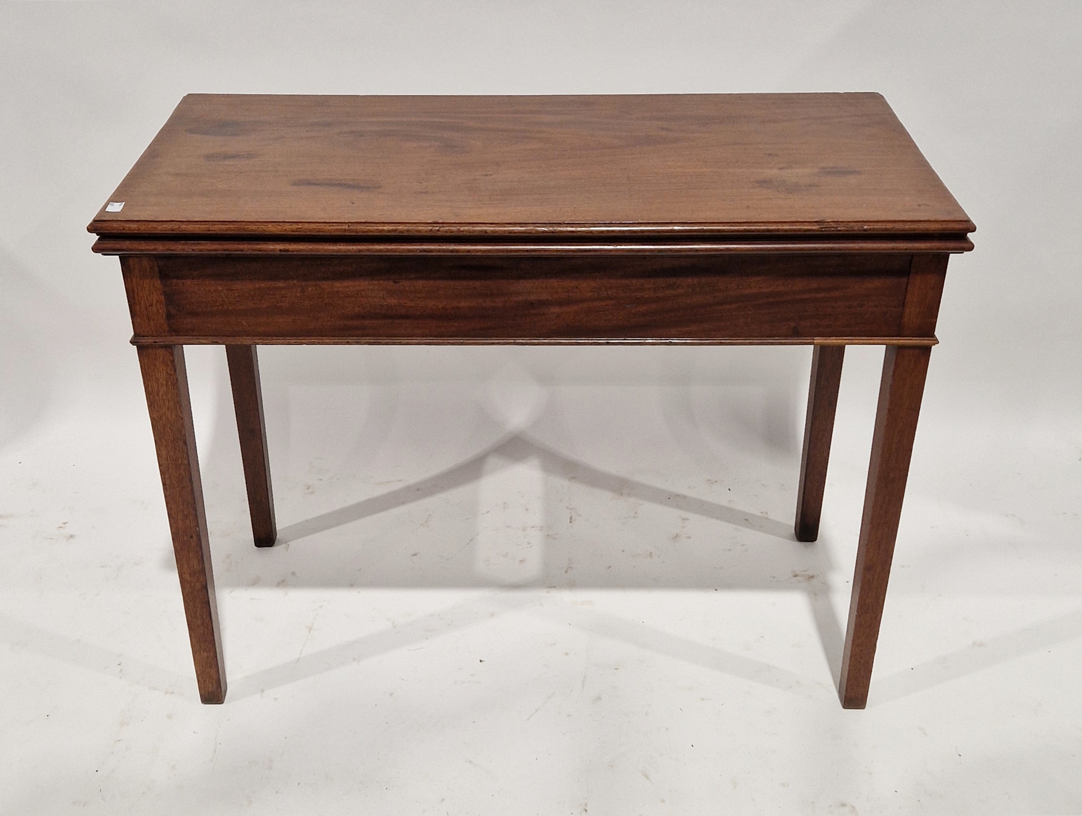 19th century mahogany rectangular folding side table, the moulded top above tapering square