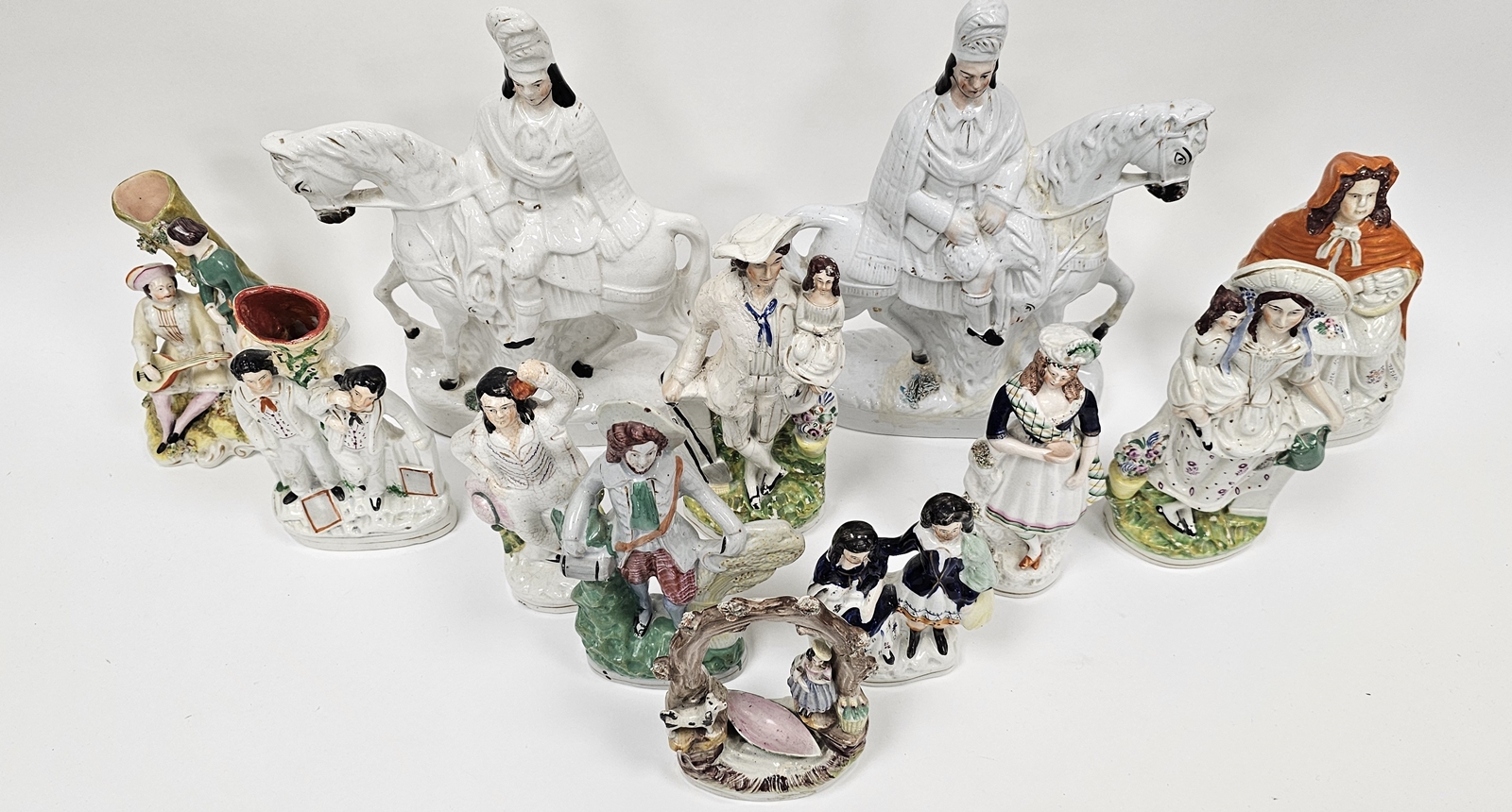 Large collection of Victorian Staffordshire pottery flatback figures including a girl beneath a - Bild 2 aus 2