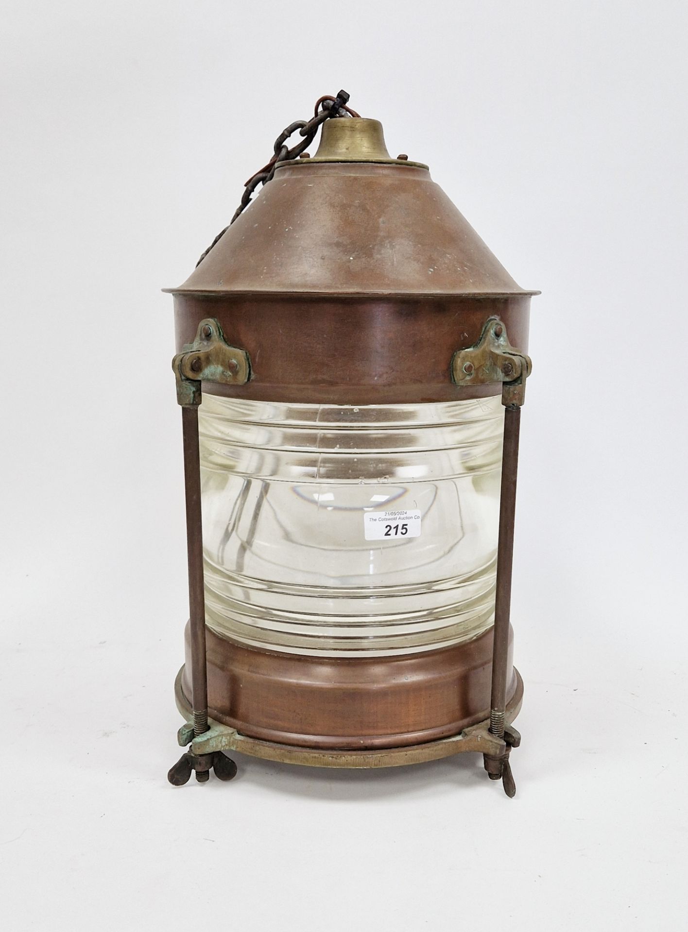 Early 20th century copper and brass-mounted ship's lantern suspended from a chain, 39cm high