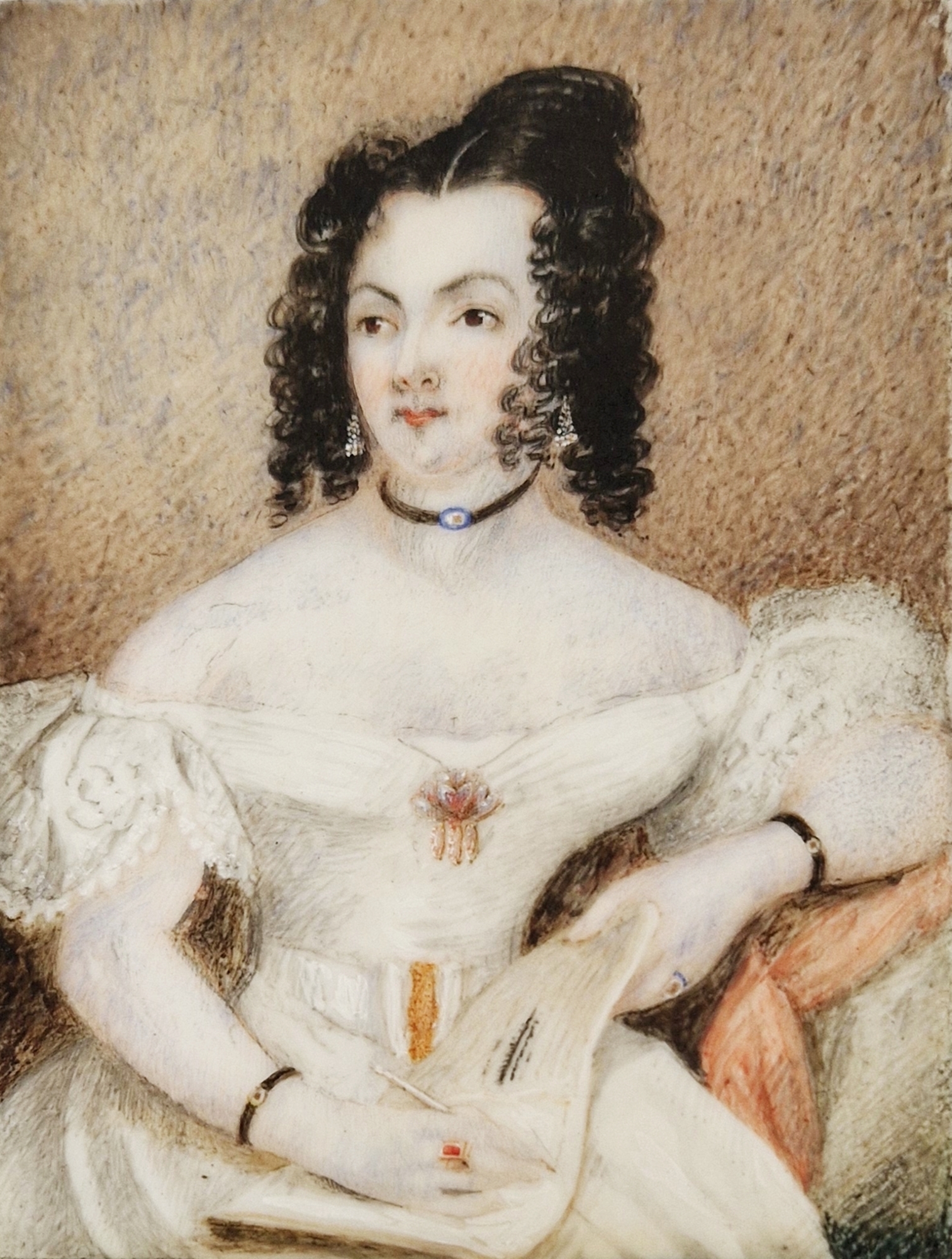 Early 19th century watercolour portrait miniature on ivory of a lady, dated verso 1828, gilt