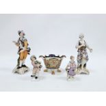 Pair of late 19th century Berlin-style figures in the Meissen-style decorated with flowers on gilt