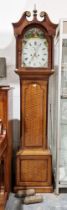 19th century oak and mahogany longcase clock, the hood with swan-neck pediment centred by brass