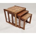 Nest of teak trio coffee tables, rectangular, the tallest with tile inlay, 50cm wide