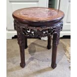 Late 19th/early 20th century Chinese carved hardwood occasional table of circular form with marble