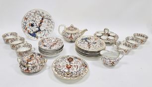 Derby porcelain imari pattern part breakfast service, mid 19th century, iron red crown batons
