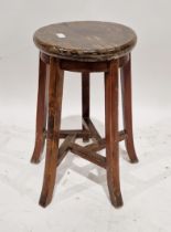 Early 20th century Chinese stool, the circular top raised on four splayed legs joined by