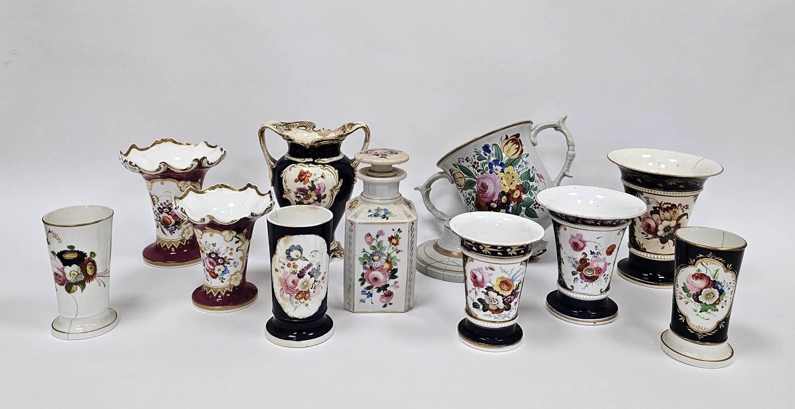 Collection of 19th century English porcelain vases, a pearlware two-handled named loving cup named