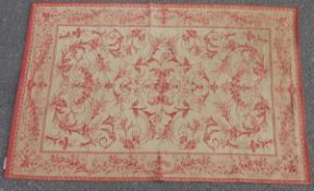 Laura Ashley woven wool rug of revived Savonnerie design, in ivory and iron red with allover