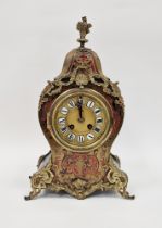 Louis XV-style ebonised and boulle mantel clock in balloon-shaped case, having gilt metal flame