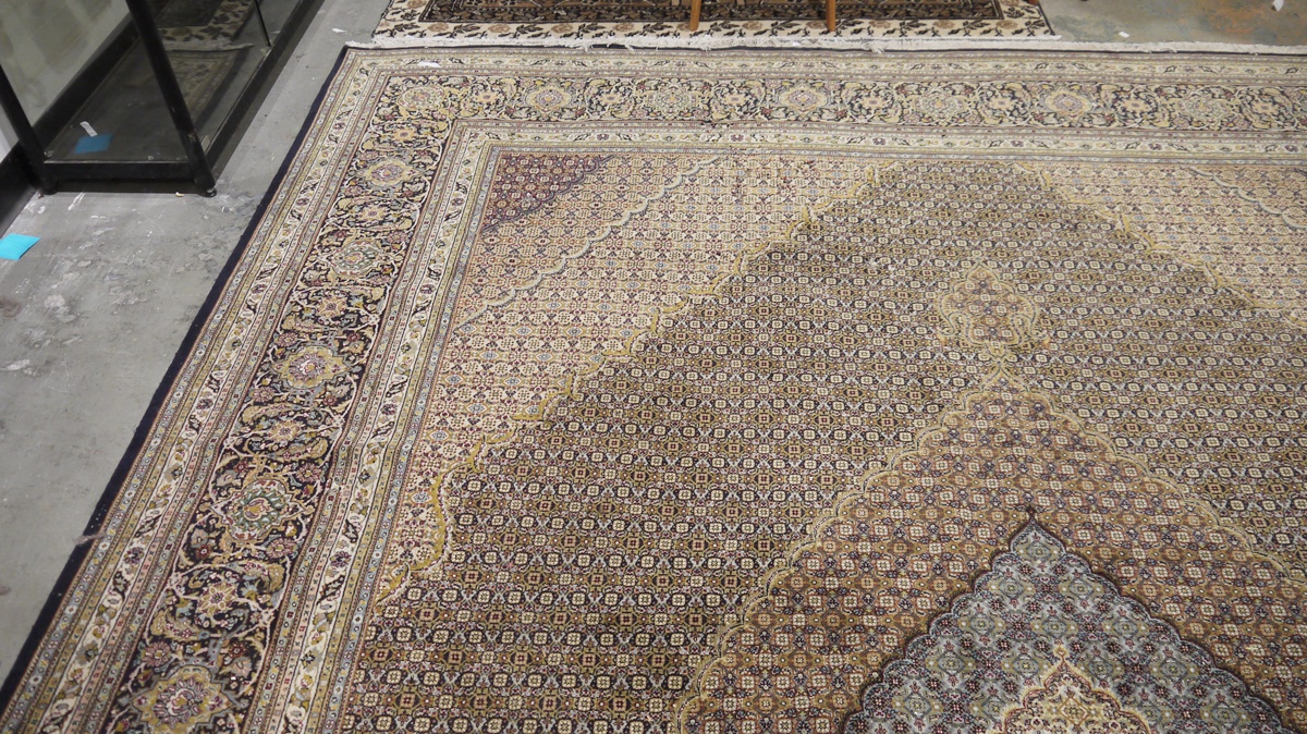 Large Persian wool carpet with concentric scalloped lozenge arabesques to the field, each with - Image 2 of 6