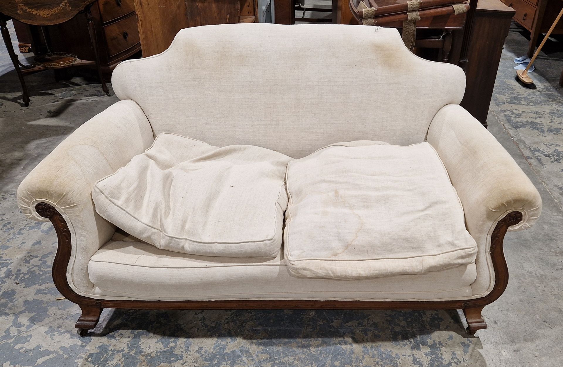 19th century two-seater sofa with scrolling back, carved floral motifs to the end of the arms, 160cm