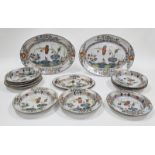 Faenza (Ferniani) faience composite part dinner service, circa 1770 and later, painted with stylised