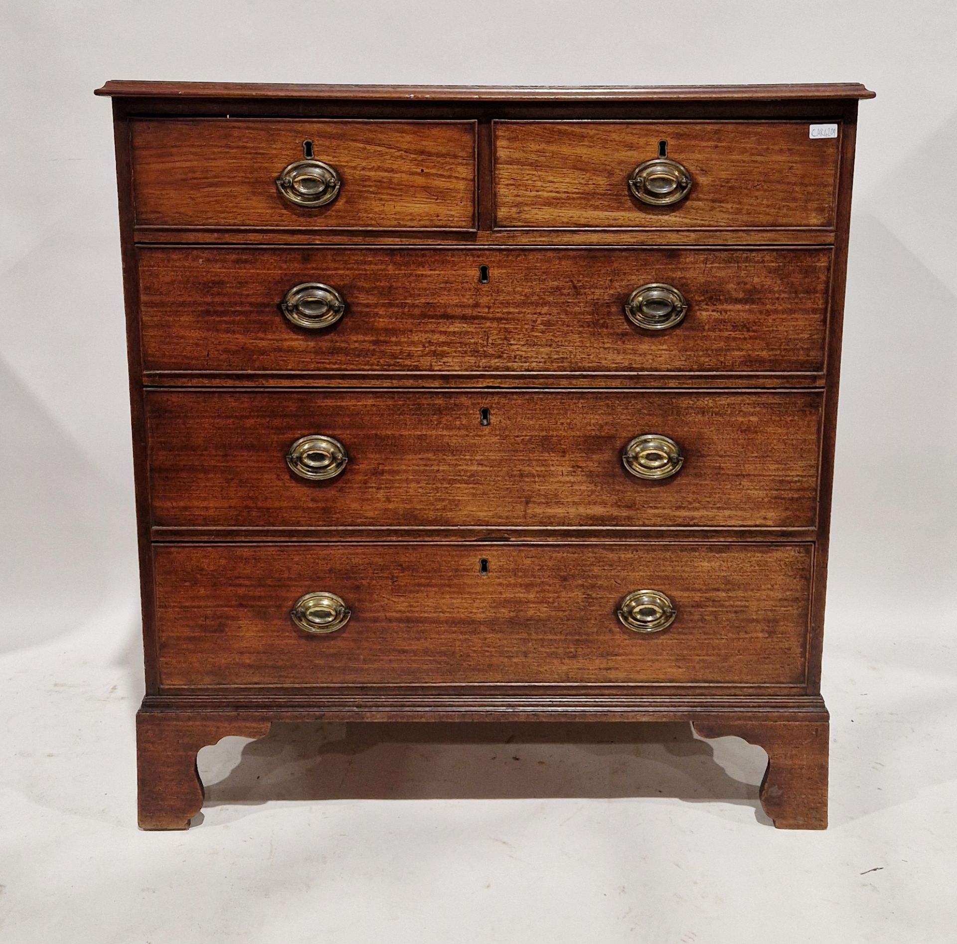 George III mahogany chest of two short and three long graduated drawers with cockbead borders, brass