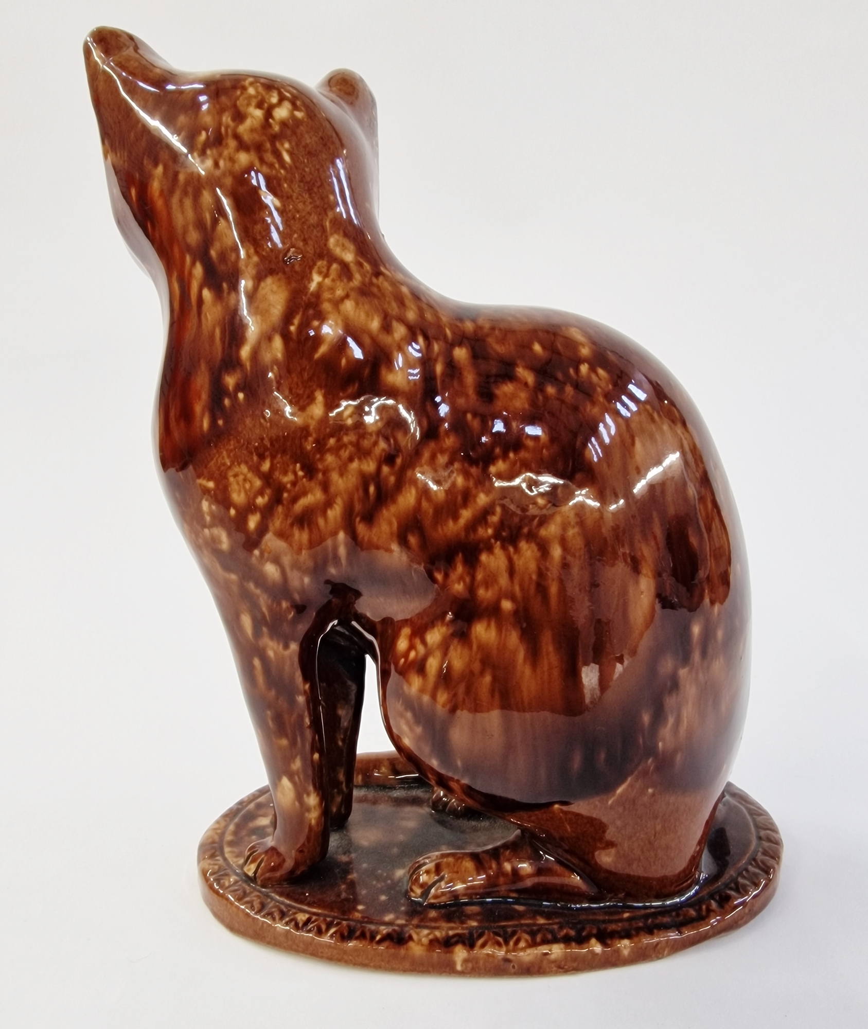 20th century pottery model of a cat, enriched in mottled brown Whieldon-style glaze, modelled seated - Image 3 of 4