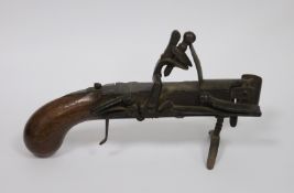 Late 18th century Strike Alight flintlock table pistol, engraved with scrolling foliage, with side