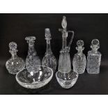 Group of 20th century cut glass decanters, a claret jug and stopper, 42cm high, an etched Rand