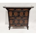 Small Asian lacquered and bamboo weave side cabinet, the top with raised ends, three short drawers