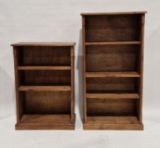 Two 20th century pine bookcases in sizes, the larger example with three adjustable shelves, 124cm