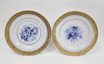 Two Limoges (Vizavi) large porcelain dishes, each transfer-printed in blue with putti amongst