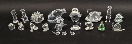 Collection of Swarovski crystal animals and other items including a snowman, polar bear, mouse,