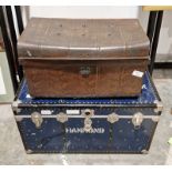 Large travelling metal trunk and a vintage tin trunk (2)