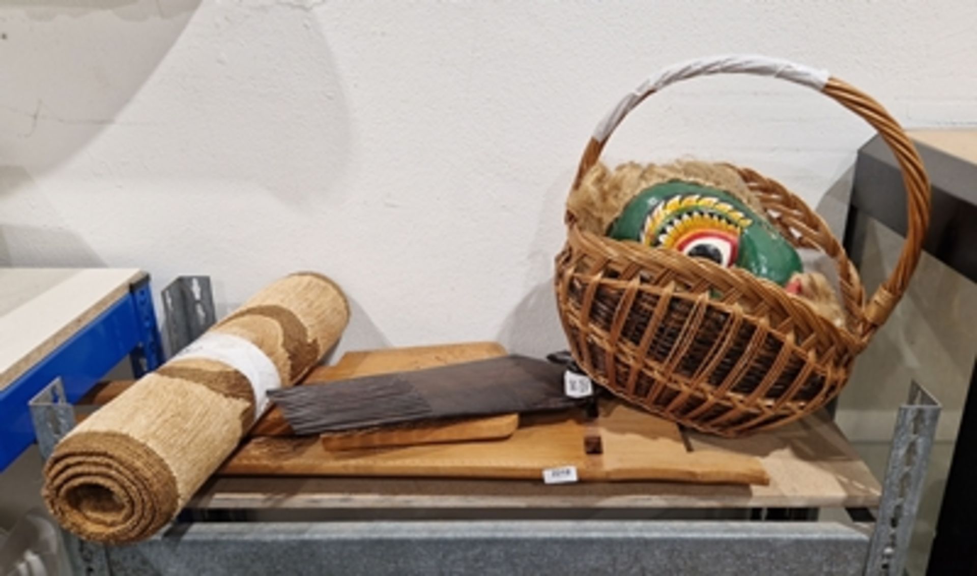 South Asian painted and carved mask and carved African birthing chair, a large comb with tribal