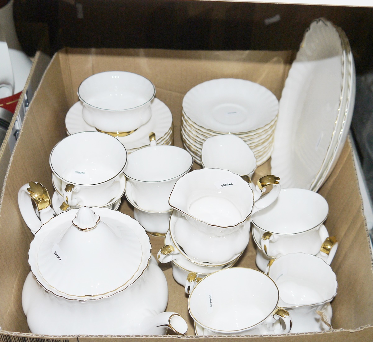 Royal Albert Val D'Or part tea service to include teacups, saucers, milk jugs, teapot, side