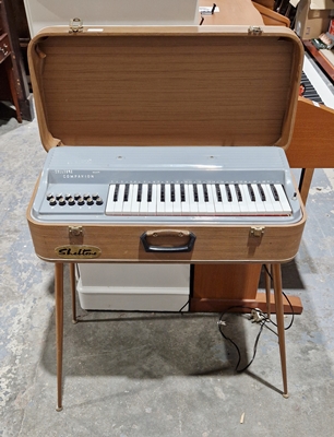 1950's/60's Sheltone companion major electric organ in fibre case and on slender circular tapering