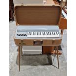 1950's/60's Sheltone companion major electric organ in fibre case and on slender circular tapering