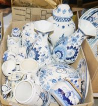 Large quantity of delft blue and white wares to include a pair of floral decorated delft blue and