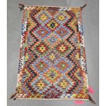 Chobi blue ground kilim,  with two rows of five hooked lozenges and one row of four, single