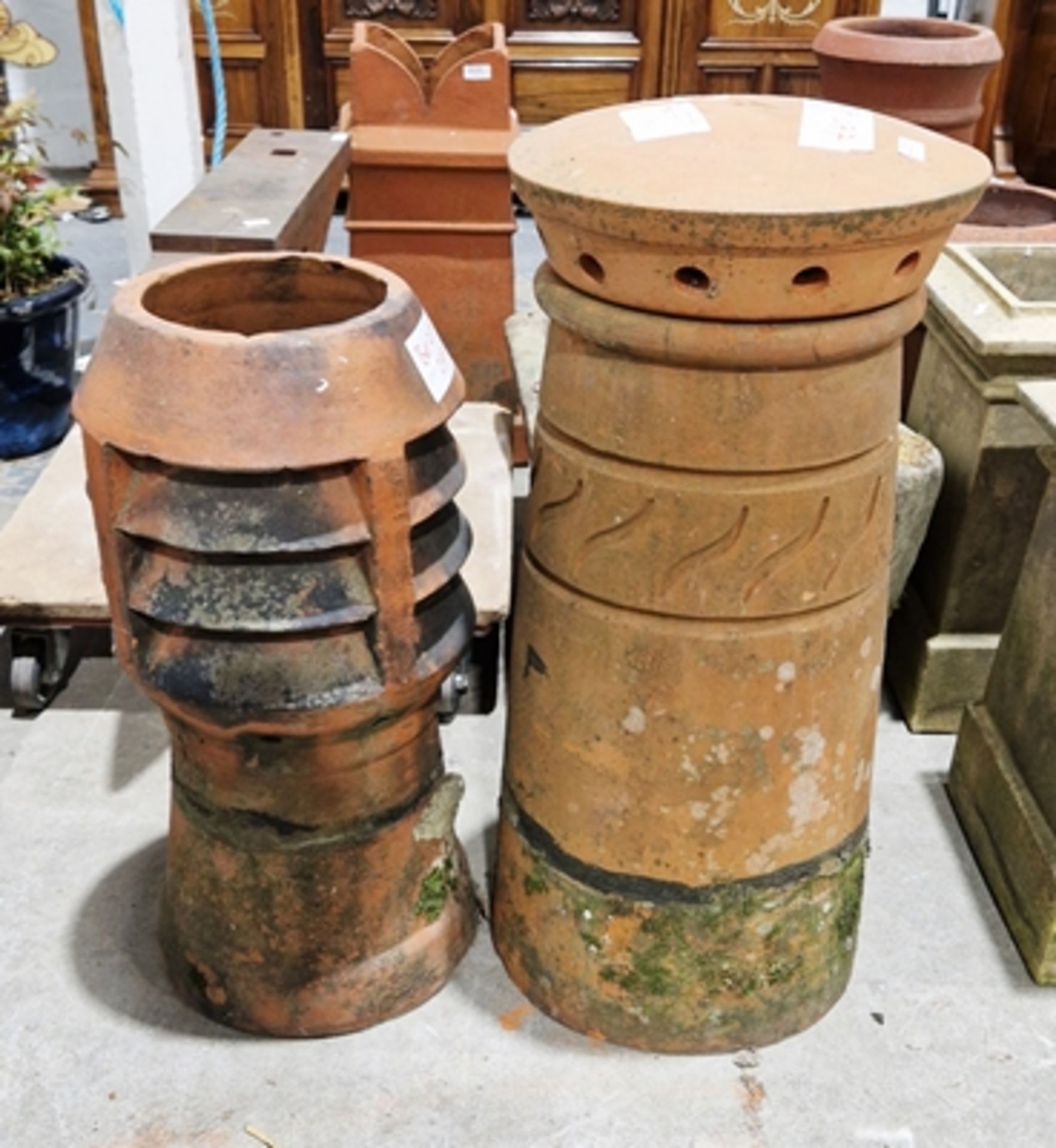 Two terracotta chimney pots, one with elephants foot cowl (2)